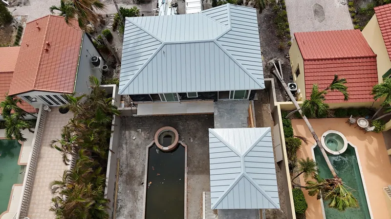 Newly installed standing seam metal roof on a coastal Southwest Florida property